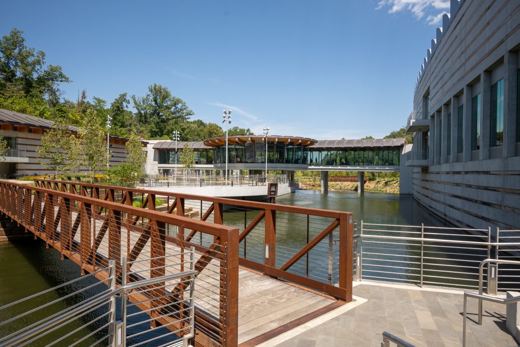 Crystal Bridges Museum of American art with splash pad and bridge.