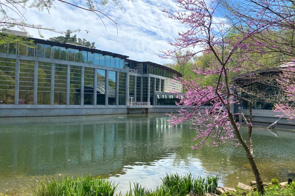 Exterior of Crystal Bridges Museum in the spring.