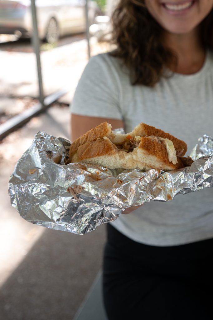 Close up of a barbecue pork sandwich. with sauce and coleslaw. 