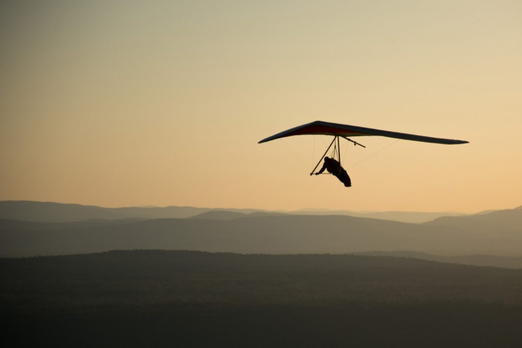 hang glider at sunset