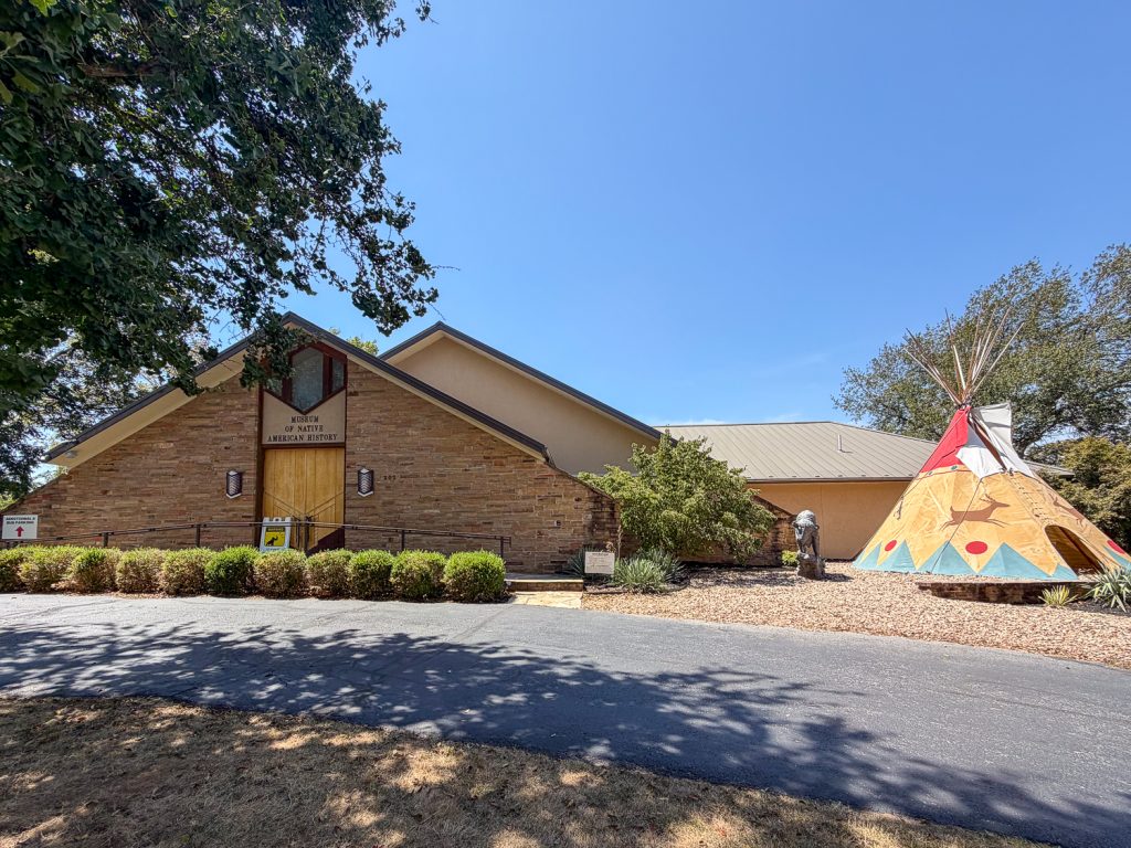 The Museum of Native American History in Bentonville. This is a small building with a teepee outside.